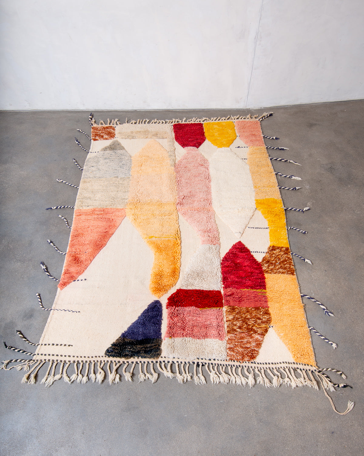 Modern, designer, handcrafted Berber rug from Morocco. Beniourain carpet with beautiful colours and patterns and fluffy wool texture.